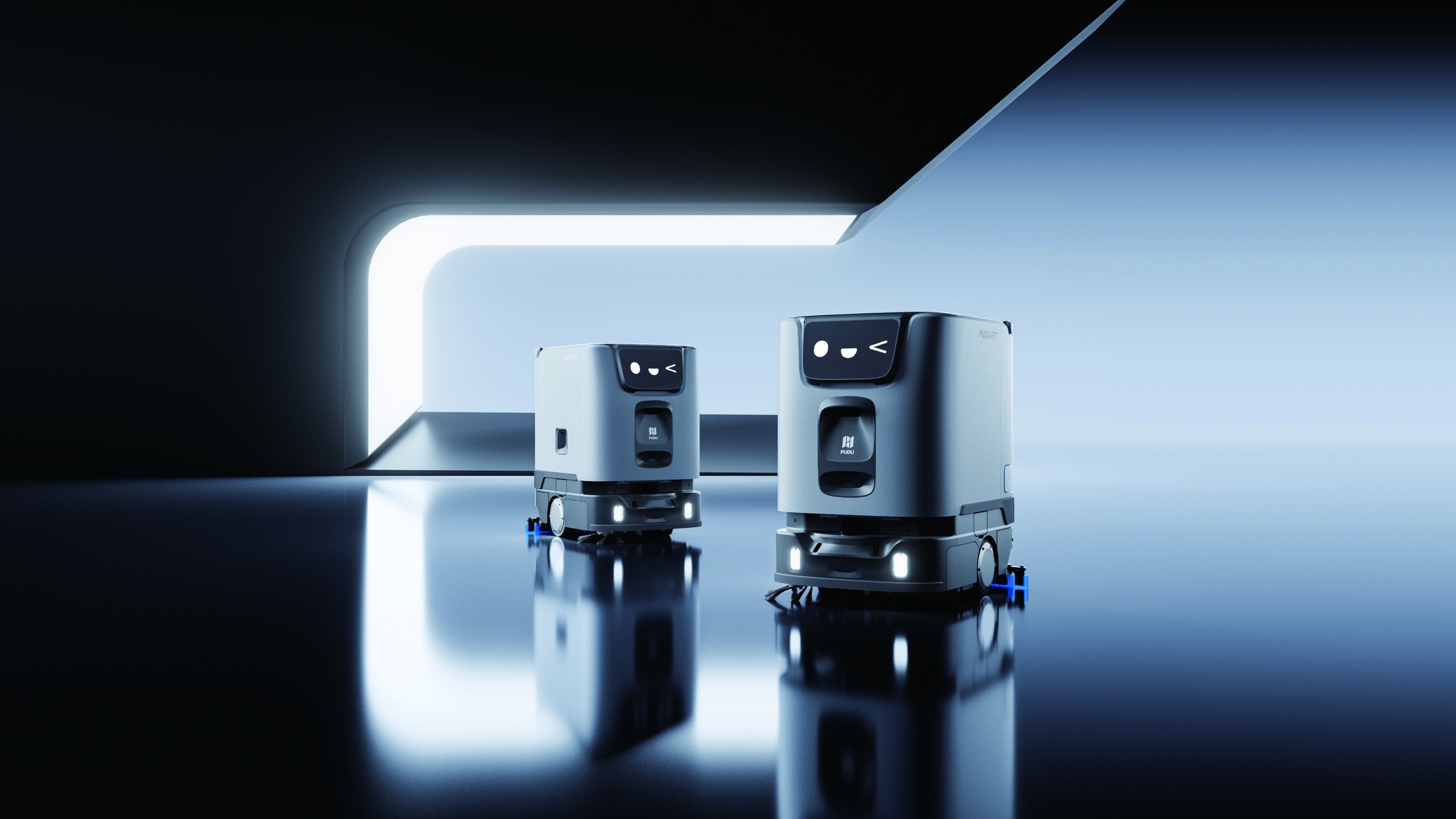 Zwei PUDU ET1 Reinigungsroboter in einer technischen Produktinszenierung